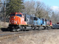 CN train 435 with 5696, IC 2462 and 2124 curve through Paris, Ontario with work at Paris West ahead. 

