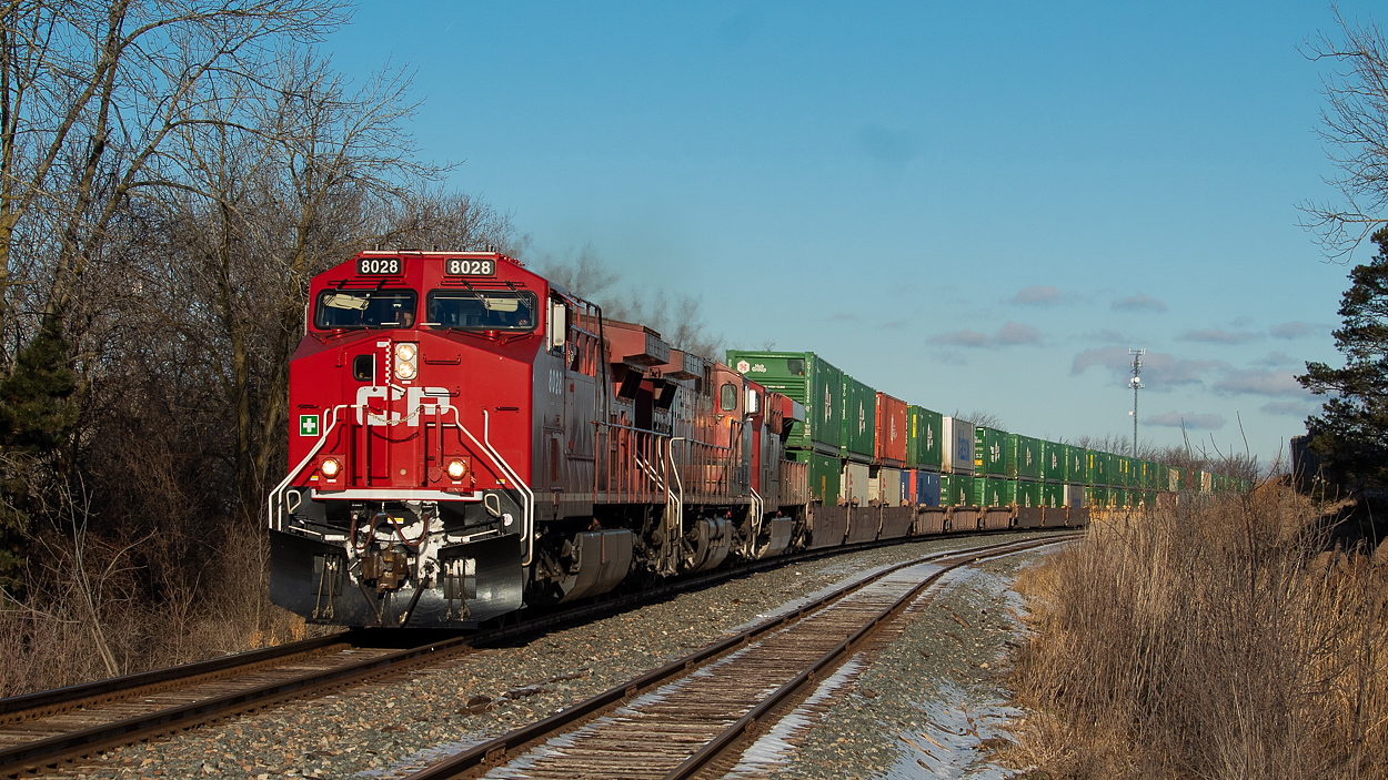 I was out in Hamilton near Stuart Yard and heard 143 getting clearance from Park to Brookfield East, then looked over and saw the stacks over around the Bayview area. With Stuart being dead I figured I'd try something new so off to Smithville I went for a shot of 143 on a beautiful, sunny winter morning.