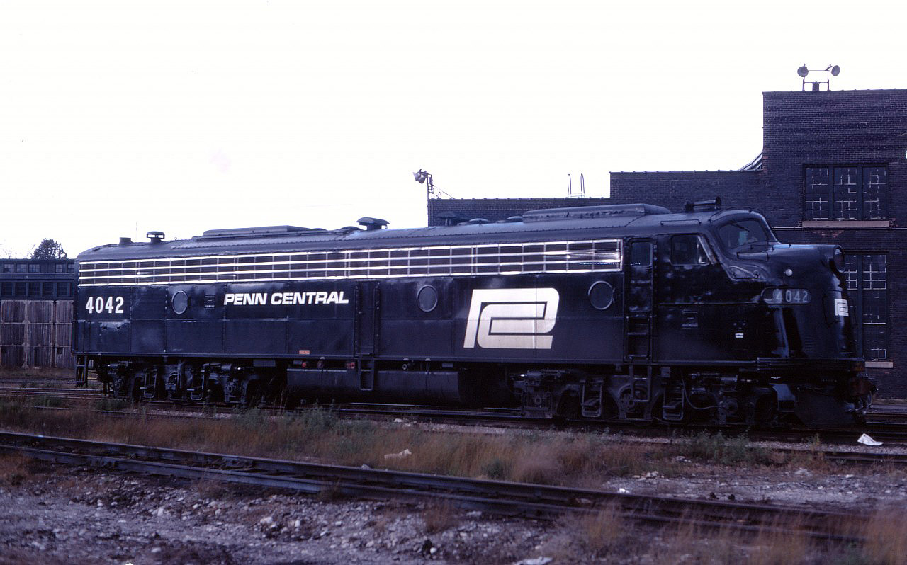 1969 was the last full year that the overnight train operated between Toronto and New York City. Normal procedure was for a CP locomotive to handle the train between Toronto and Hamilton with a New York Central/Penn Central (or TH&B) unit handling the train between Hamilton and Buffalo. The CP engine would stay in Hamilton overnight while the American unit would lay over at the TH&B's Chatham Street roundhouse during the day. It has been less than a year since the NYC-PC merger and this morning we find former NYC E8A 4042 in PC black awaiting its nocturnal run back to Buffalo.