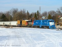 Three units on this job was somewhat rare on GEXR, and I last photographed a triplet <a href=http://www.railpictures.ca/?attachment_id=14397 target=_blank>back in 2014</a> when OSR's ex CP 8235 was on lease to GEXR. This past weekend 540 came over to Guelph with the big set of power, normally used on 568. After finishing working the north end of Guelph I was able to photograph the train southbound at Edinburgh/Paisley Rd in really nice sunlight. <br><br> History lesson time: Knight Lumber used to occupy this site and was demolished around 2012 opening up this angle. Further back this used to be the terminus (yard and station) of the <a href=http://www.trainweb.org/ontariorailways/railgwr.htm target=_blank>Galt and Guelph Railway (Great Western)</a> built in 1857 which by 1871 was further extended north to Fergus, Palmerston and Southampton <a href=http://www.trainweb.org/ontariorailways/railwgb.htm target=_blank>(as the Wellington Grey and Bruce Railway)</a> which was  all acquired by the Grand Trunk Railway by 1882. With the extension to Southampton and with Palmerston as a division point for other Branches a lot of traffic from Toronto ran through here (passenger and freight) but it was quickly deteriorating by the mid to late 60's. Around 1970 passenger service stopped, but a new Nuclear plant was built at Douglas Point near Southampton and new life was breathed into the old Wellington Grey and Bruce with 80 car oil trains running along 100 miles of upgraded (fortified) branchlines from Guelph until 1975  today's oil trains are not new and imagine them running on such rickety and well worn track as it was then! CN now services this branchline 6 to 7 days a week. If anyone has pictures of the Oil Trains along the Bruce Branches consider pulling one out to share :) Thank you.