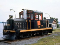 Thousand Islands Railway locomotive 300 is shown on display by the Gananoque River at Sculpture Park in Gananoque, a few years after retirement by CN. This was a one-of-a-kind home-built locomotive dating from 1930 that ran on the TIR for years until it was retired in 1963, and donated by CN to be put on display in 1966.