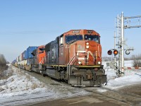 SD75I CN 5737 and SD70M-2 CN 8830 head south with an intermodal on the Camrose sub.