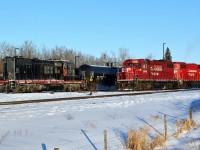 A pair of CP GP38-2s and an unidentified Canadian Railserve GP9 sit in CP's Scotford Yard.