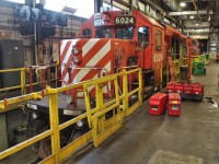 After some engine checks and pre-lubing SD40-2 6024 is getting fresh batteries so it can go back into service.