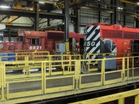 A pair of SD40-2's in the shop awaiting repairs to get back into service.