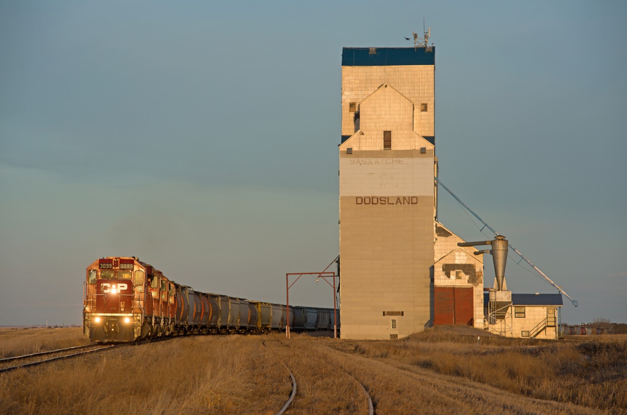 Welcome to Dodsland Saskatchewan. Dodsland sits at mile 86.6 of CP's Kerrobert Subdivision. Only the western portion of this line is operational. This train originated at Prairie West Terminal at mile 82.1 and will continue on to Kerrobert at mile 102.5. From there it will take the 46.4 mile Macklin Sub, then the western half of the Hardisty Sub, and eventually get to the main line...one day. Trains on this line are quite sporadic and unpredictable.
