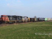 I was just a rookie when I shot this and at the time there was a lot of foreign power passing through Sarnia so this KCS trailer was no big deal at the time. Boy would I love to see this trio today, CN 2444, IC 1025 and KCS 3916 head west at Camlachie Sideroad.