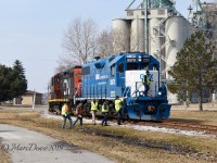 Sarnia, ON., yard switchers CN 7270 and GMTX 2273 ventured down to the elevator this morning on what's known as the "Teddy Bear Express". A training session for new hires(yellow vests) under the watchful of eyes of a veteran conductor(orange vest) and engineer. 