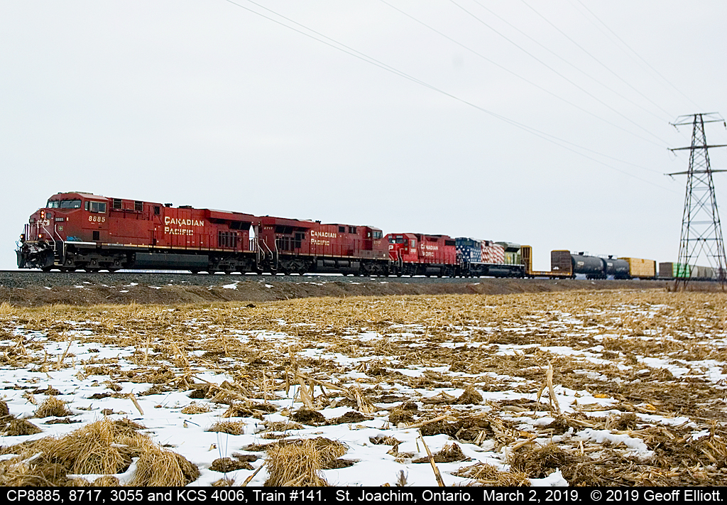 Dark day....  :-(   CP 8885 west, Train #141, has KCS Veteran's unit 4006 in tow as is rolls past MP 90.8 on the CP Windsor Subdivision just west of St. Joachim, Ontario.  4006 is dead-in-tow due to issues that happened on it's trip from Winnipeg to Toronto.  I'm sure KCS will be happy to get the unit back after being in Canada since early December 2018!!