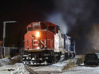 Change is inevitable. My night time trips to Preston over the last few years were always something to look forward to, especially considering the night lighting was usually not to challenging behind the used car lot. Unfortunately my night trips as back up company rep. at the Toyota plant were coming to an end and this bitterly cold night would mark my last trip. Within a week production of the Toyota Corolla in Cambridge would end for good along with my 22 years of employment with a major supplier. I believe the Corolla has been built there since the plant opened in the mid 1980s. Never the less this spot in Preston has been home to parked power for both the GEXR and CN for years and continues to do so. With a wind chill close to -30 this night the units prime movers will get no rest. It was nice of the crew to forget to turn out the headlight this night as it almost makes it look as if the power is about to switch out the centre beams at the wallboard facility but that won’t happen till daylight.