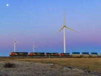 Near sunrise, CN AC 2812 leads intermodal train Q120, as they rumble by the turbines, approaching Amherst, Nova Scotia. I was going to edit out the white of the moon from the photo, but I decided not to. 
<br><br>
Referring to the title, a few days before this, a full moon was in the area, and was sinking down to the horizon at sunrise, which would have made this location a great spot. Oh well, next time. 
<br><br>
March 24, 2019