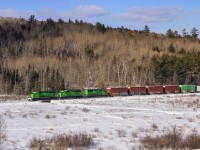 NBSR 6319 leads a trio of green power through the winter fields of Southern New Brunswick, at Clarendon. 