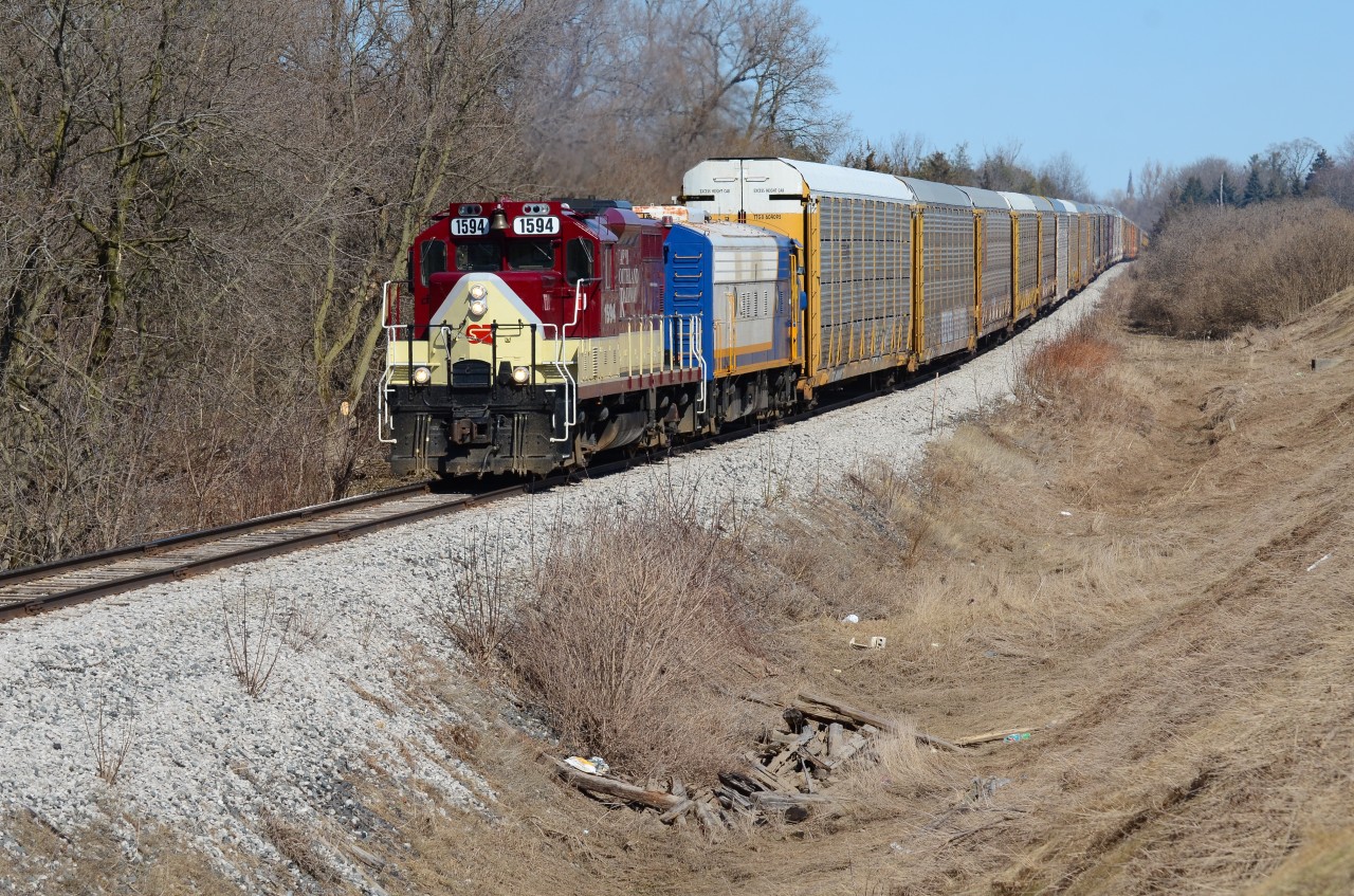 Not a cloud in the sky here! OSR’s Woodstock Job proceeds westward with a cut of auto racks lifted from CP in Woodstock. Never seen this run on a weekend so kind of lucky to get it on a sunny day