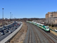 Having left Union Station moments ago, GO transit MP40-PH 622 pushes its 12 car mixed Bombardier train westbound along the Oakville Sub. In this scene they are running Parallel to the Gardiner Expressway right near Lakeshore and it is a beautiful early spring morning. I always wonder if eventually all the GO Transit Coaches and locomotives will be repainted to the new metrolink scheme but I guess only time will tell. It has to be a good 4 years I’d say where it would be quite common to spot a mixed GO train in Ontario. 