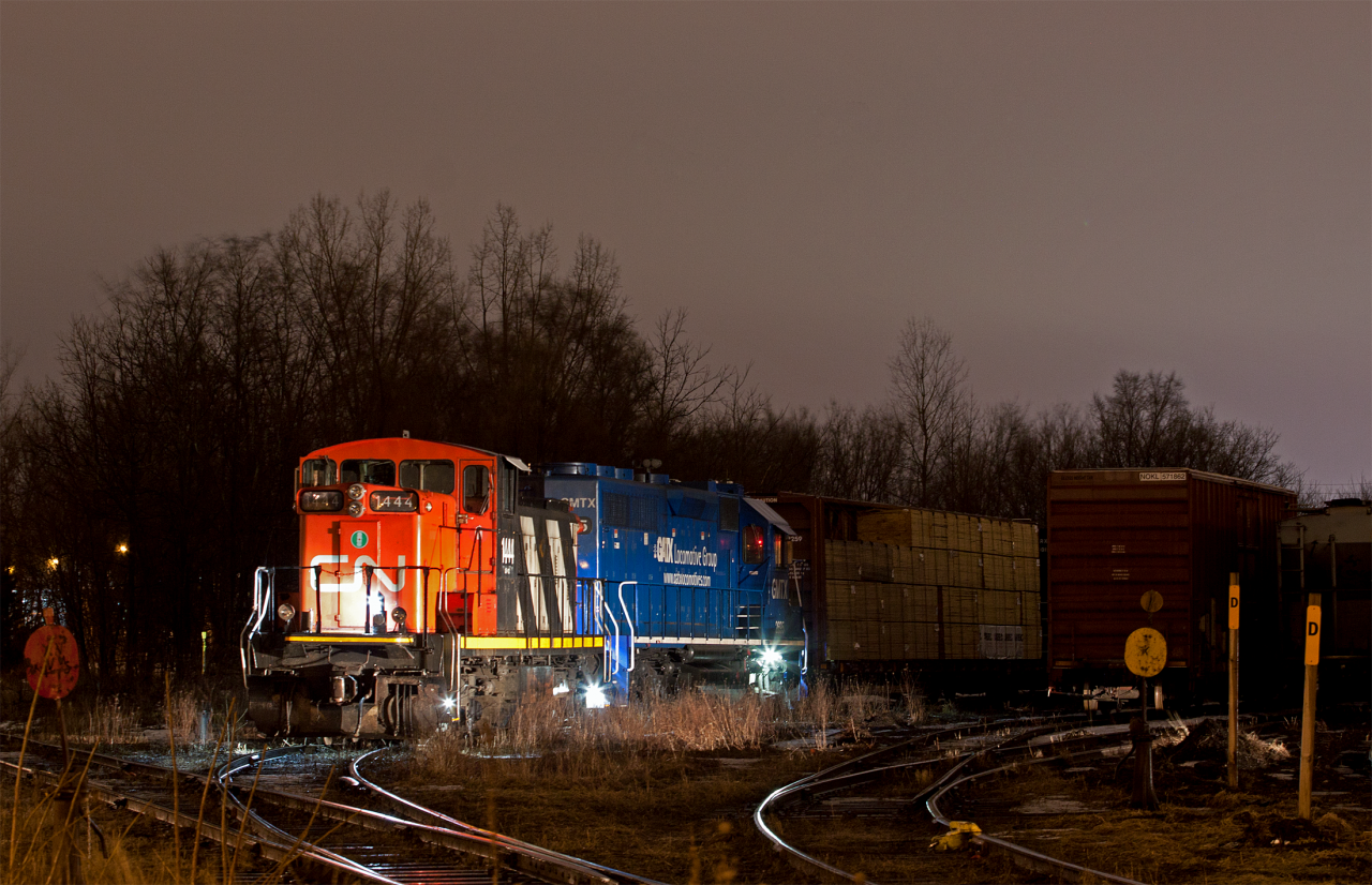 To start off, it seems fitting I acknowledge everyone that led to me getting this shot. I need to thank Alex S. for the info that 542 was dying in Guelph this night. Worth noting that he has also recently done some Guelph night photography too with  this  awesome shot. Upon arriving on scene I found fellow Guelph railfan Steve Host. Steve had the idea to use his headlights to light up the scene. After thinking about it, my non-foamer friend Dylan (who came along to check out the thrills of railfaning) had the idea to grab my car and get some lights on it from another angle. Dylan sat in my far for the better part of half an hour with the high beams on the subject matter, I can’t thank him and everyone else enough. The result was the image above, which was a lot of fun to get. Normally the train comes, rolls by and that’s it. It lasts for only a few short minutes. Here I was able to enjoy the event for a solid half hour. The CN side of the situation seems 542 working late, and getting trapped on the North side of the Guelph sub overnight due to the steady stream of GO Trains and the crew dying on hours. Hoping it’ll happen again, but I don’t think CN likes leaving power in Guelph, it probably will sooner or later though so until next time...