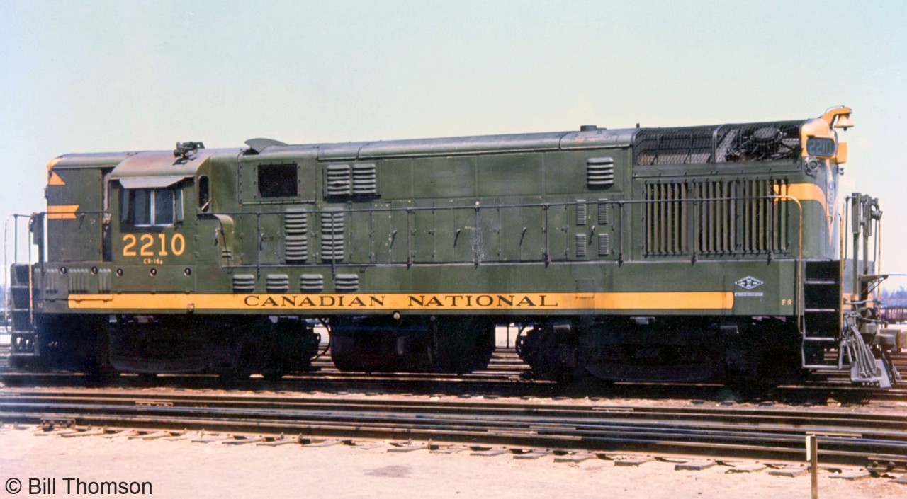 CN 2210, a CLC H16-44 (sometimes called a "Baby Train Master", but that term was generally used for the H24-66's smaller sibling the H16-66) sits at MacMillan Yard in Concord ON in 1969. By this time CN was retiring its CLC fleet, and 2210 didn't have many more miles to go (if it hadn't already been retired). Many of CN's CLC units ended up at London Reclamation yard in their final days, awaiting the scrapper's torch.
