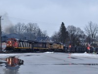 M38531 10 throttles up across Market Street with CN 2414, BCOL 4625, and GECX 9450 doing the honors. For a moment, I thought I was watching a pair of MLW's at work! 