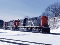 Passenger-geared CN RS18 3108, leads GP35 4000 (one of only two on the roster), and GP9 4507 off the Dundas sub for its trip over the Oakville subdivision. At the time, speeds through reversed switches at Bayview were only 15 mph so all trains took it easy through Bayview...