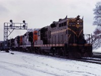 An eastbound struggles up the grade from Hamilton to Aldershot behind a trio of GP9s, 4472, 4503 and 446x.