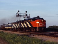 Although I don't have a written record, what appears to be train No. 147 for Windsor rolls through Aldershot East behind a matched FPA4/FPB4 set on a pleasant summer's evening in July 1968.