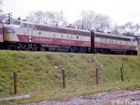 CP FP7 1420 and FP9 1406 lead eastbound train #732, stopped at CN's Sunnyside Station in 1956. At the time, you could park right beside along the then-newly opened Gardiner Expressway.  CP Train #726 (later renumbered as train #326 by 1959) was one of the daily passenger trains CP operated between Hamilton and Toronto, departing the TH&B's Hamilton Station and running over the Hamilton Sub to Hamilton Junction, before operating via running rights over CN's Oakville Sub east to Toronto's Union Station.<br><br>Timetables show the train was scheduled to depart Hamilton at 2:10pm, stop at Sunnyside at 2:59pm, and arrive at Union at 3:10pm (with a flag stop at Oakville at 2:36pm if required).