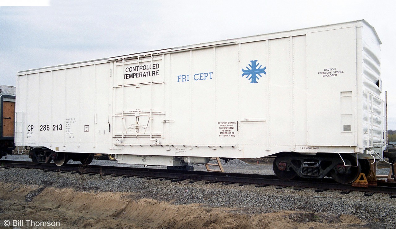 CP controlled temperature refrigerated boxcar 286213 is seen sporting a unique white "FRICEPT" livery, taken near Montreal QC in 1992. The area where the refrigeration unit would be seems to have been modified, with "Caution, Pressure Vessel Enclosed" lettering on the exterior. It is unknown if any further cars were modified or if this was an experimental one-off.