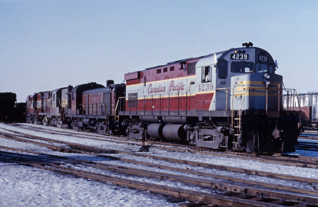 A CP extra prepares to leave the TH&B's Aberdeen Yard on a January morning in 1967. I don't recall whether the train was headed for London or Toronto...A wonderful consist, though--C424 4239, leased B&M RS3 1540, CP RS18 8785, and passenger RS10 8645.