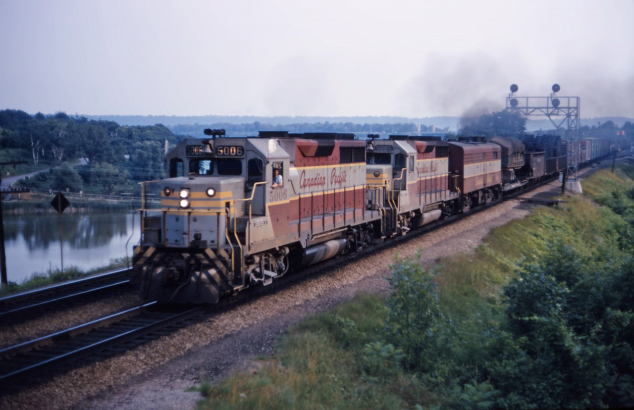 The eastbound "Starlight" struggles up the grade towards Aldershot and Burlington behind GP35s 5006, 5005, and a rare FB2 (one of only six, plus two FPB2s, on the CP roster).