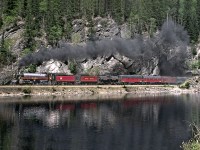 Provincially owned ex CP Royal Hudson 2860,returning from a tourist promotion tour of the U.S. west coast summits Eagle Pass of the Monashee Mountains west of Revelstoke.