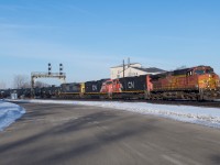 CN 396 blasts through Paris Junction with BNSF 5241 on the point.  This train came into Sarnia with the BNSF 3rd but issues with their lead SD75i resulted in a shuffle of power and a foreign leader.  It was worth getting out of bed early on my first day of March Break for this!