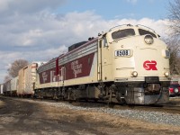 The Woodstock Job slows to set off their cars at Ingersoll amid a brief moment of sunlight in a fairly cloudy afternoon.  Tasked with the train today is the attractive pair of matching F Units that I always enjoy coming across.