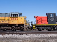 Here is a pairing that I didn't think I would ever come across trackside.  UP 8547 and CN 1412 stare each other down on CN 385.