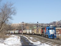 CN 596 has 29 grain cars picked up on track 29 as it heads towards the Port of Montreal with GMTX 2257 & CN 9547 for power. After a rainy day on Friday, Montreal awoke to a bit of snow, with the skies clearing up later in the morning.