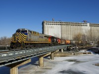 Leased ES44AC CREX 1519 and fairly new ET44AC CN 3133 is the power on CN 527, seen entering the Port of Montreal with 70 cars in tow.
