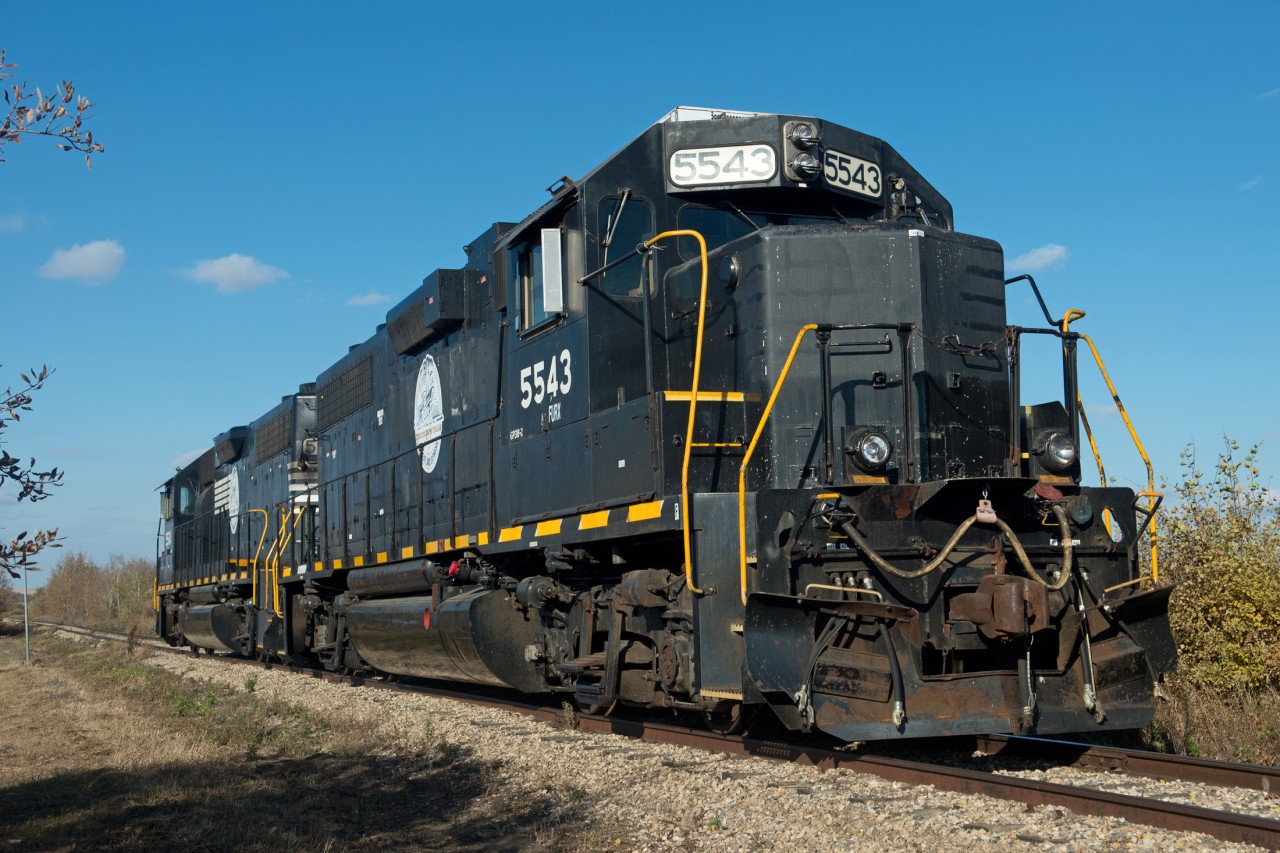 FURX 5543 and 5541 sit tied down at the north end of Wakaw Saskatchewan, presumably waiting for the next excursion of the Wheatland Express Excursion train.