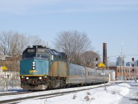 VIA 69 heads west on the north track of CN's Montreal Sub with VIA 6406 and four LRC cars.