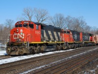 CN 580 arrives back in Brantford with 15 cars off of the Hagersville Subdivision.  Decades ago a set of three GP40-2L(W)s powered high priority trains like the Laser and were as common as dirt on the mainline, but now they've been relegated to lowly local duty.  On a bright sunny winter day they still look good being over 40 years old.  Is 9543 still in original paint?  Pretty impressive if it is. 
