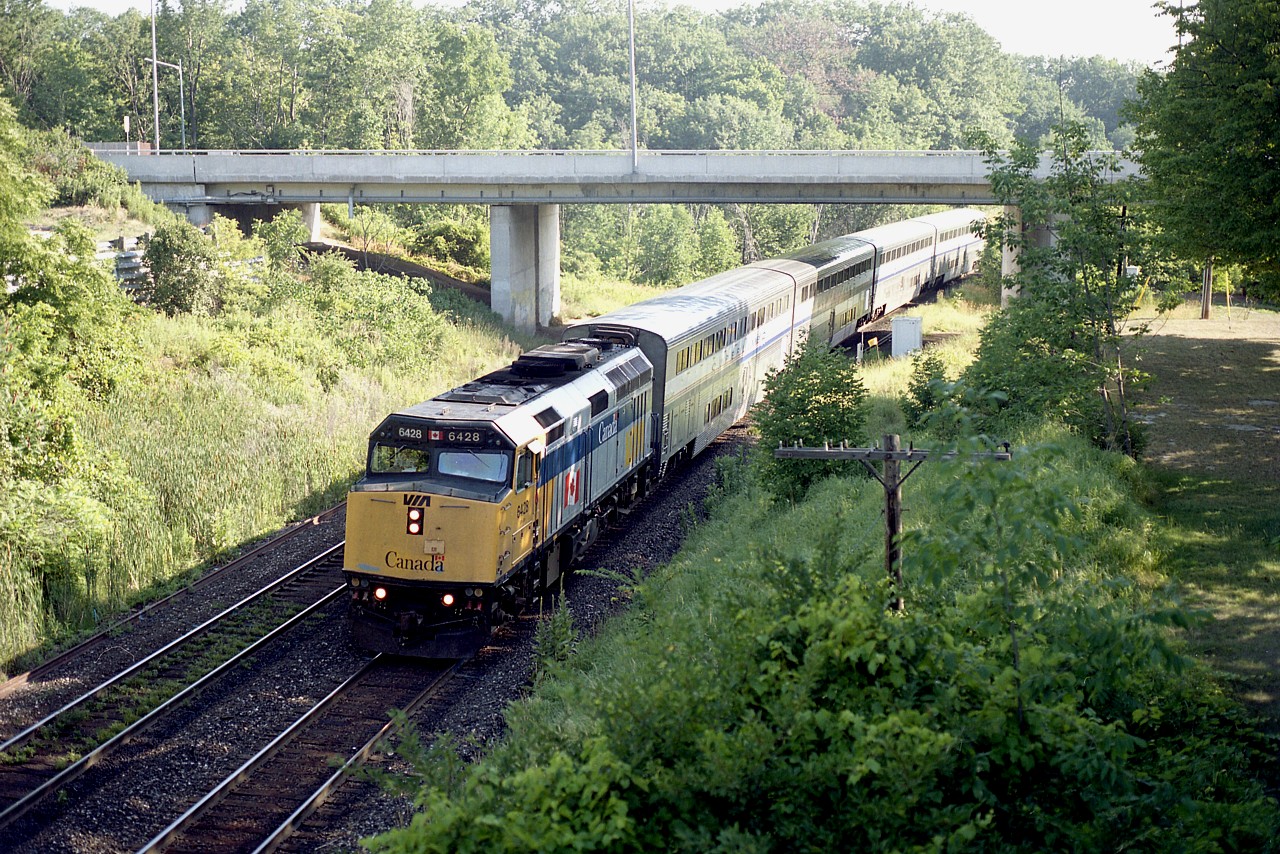 A most unusual sight this morning was the AMTK International consist behind VIA 6428 on a detour route, destination Sarnia. This rather than the regular GEXR Guelph Sub route. Trouble is, I cannot recall the reason for the detour.  Photo looking east from the Bayview Walkbridge, early morning.