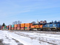 IC 2462, and BNSF 6145 lead on CN Q14891 28 with 128 cars