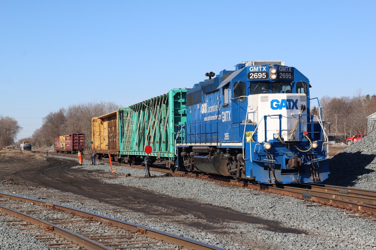 I have always found the histories of locomotives interesting. Here we find what appears to be a leased GP38 working CN local 542. If you dig a bit deeper as well as look to the roof it reveals that the unit was indeed originally built as a GP40 for Seaboard Coast Line. The three fans on the end of the roof illustrates this, while the box on the roof in front of the dynamic brake blister shows that it has since been rebuilt into a GP38. Local 542 is seen here dropping its empties while its loads wait on the siding in the distance and well make the trip to Cambridge later in the afternoon after the crew work the industries around Guelph. Apparently GMD-1 1444 stayed in Preston this morning after suffering mechanical issues.
