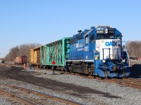 I have always found the histories of locomotives interesting. Here we find what appears to be a leased GP38 working CN local 542. If you dig a bit deeper as well as look to the roof it reveals that the unit was indeed originally built as a GP40 for Seaboard Coast Line. The three fans on the end of the roof illustrates this, while the box on the roof in front of the dynamic brake blister shows that it has since been rebuilt into a GP38. Local 542 is seen here dropping its empties while its loads wait on the siding in the distance and well make the trip to Cambridge later in the afternoon after the crew work the industries around Guelph. Apparently GMD-1 1444 stayed in Preston this morning after suffering mechanical issues.