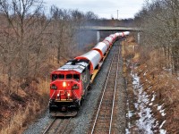 CN 2442 runs full power as it heads up the Dundas sub at mile one hauling 388 axles of 3085mm pipe. There was plenty of chatter on the radio on needing pushers to get it up the grade in to Copetown and it indeed was true as it stalled out at mile 9.5.