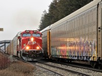 CP 147 led by the lone CP 8046 (former CP 9531) catches the tail end of CP 246 at mile 37 on the Galt sub. The lights illuminate the graffiti very nicely.