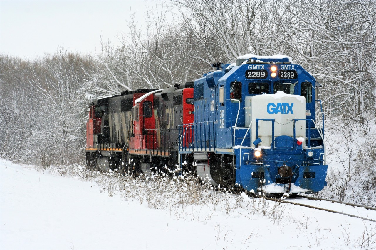 The calendar might say spring; however CN L568 is rolling through a winter wonderland on the Huron Park Spur in Kitchener as it approaches Victoria Street. The train, powered by GMTX 2289, 7080 and 9675 had set-off cars at the interchange with Canadian Pacific in Kitchener as well as spotted one boxcar at Convoy Supply Limited. After returning on the spur light power to the Guelph Subdivision, the units would head westbound to Stratford. March 31, 2019.