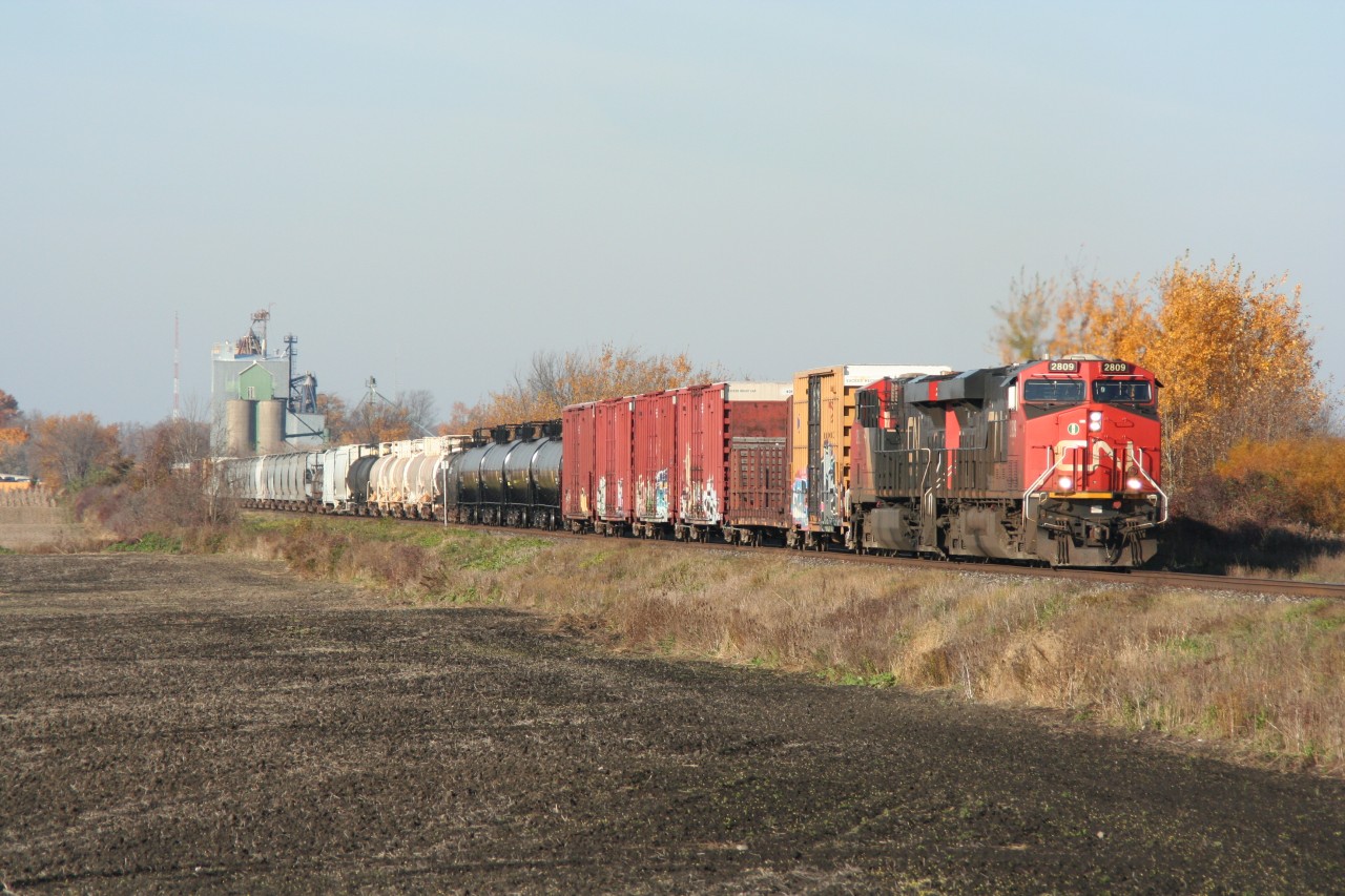 CN 2809 leads an eastbound freight through the town of Wyoming, Ontario on a pleasant autumn afternoon.