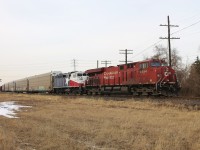 CP 140 departs Windsor Yard after making a set off and a lift. Trailing is TRE 124 which had been involved in a severe and unfortunately fatal grade crossing accident with a dump truck in Fort Worth, Texas. It was on its way to be repaired (I presume at CAD but I'm not 100% on that).  