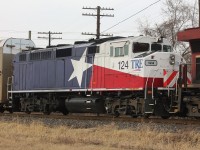This is a roster of TRE 124 as it heads dead-in-tow behind CP 9354 to Toronto. I believe this is an ex GO F59PH. The unit was involved in an unfortunate fatal grade crossing accident with a dump truck in August 2018 in Fort Worth, Texas. After comparing the unit to photos at the crash site it has undergone some repair since the wreck but is still being sent to another shop for heavier repairs. The bulk of the damage is on the conductor side of the unit and not really visible from this angle but if you look closely you can tell the shield on the front is scuffed up and the hand rail is damaged. I hope the TRE crew was able to recover from the incident. 