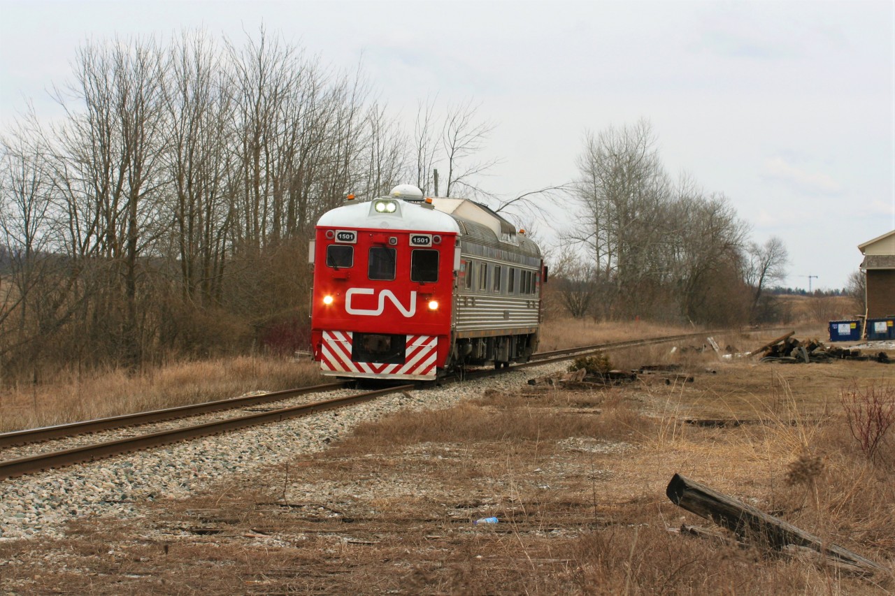 Foreshadowing what was to come later in 2018, CN 1501, which is a Budd RDC Track Geometry Vehicle is seen rolling westbound towards Stratford through Petersburg no doubt documenting the track conditions of Goderich-Exeter Railway's (GEXR) Guelph Subdivision. The RDC had already had a busy morning operating over the Fergus Spur between Guelph and Cambridge as well as the entirety of the Huron Park Spur in Kitchener. Once VIA Rail train 85 had cleared the block at Kitchener, CN 1501 would follow it westward to London and back onto home rails at London Jct.