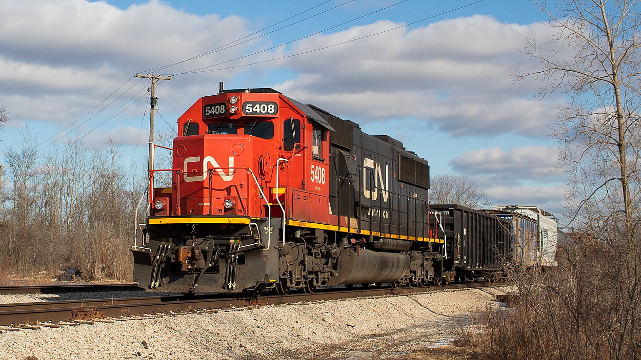 CN 5408 leads L562 off of the CP Hamilton Sub and onto the Trillium Cayuga Spur to set off a dozen cars for interchange with Trillium at Feeder Yard. They would lift traffic as well, and return to Port Robinson long hood forward via the Hamilton Sub. I recently shot TE11 here as well, shown in this shot dropping a large string of grain hoppers  for Trillium. CP and CN access feeder yard from opposite directions, so the CP local clears the switch and shoves back in.