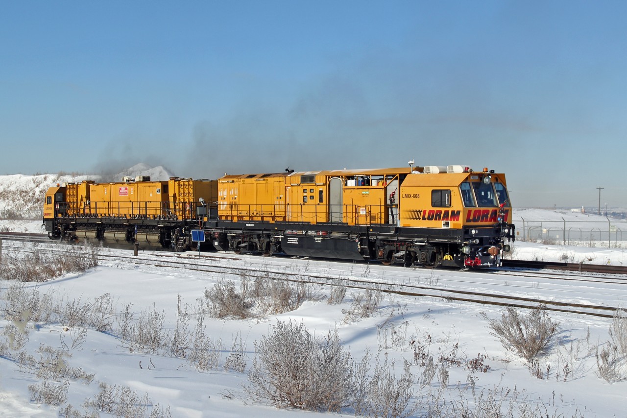 Loram special track grinding unit #608 works betwee Bretville Junction and Clover Bar yard.